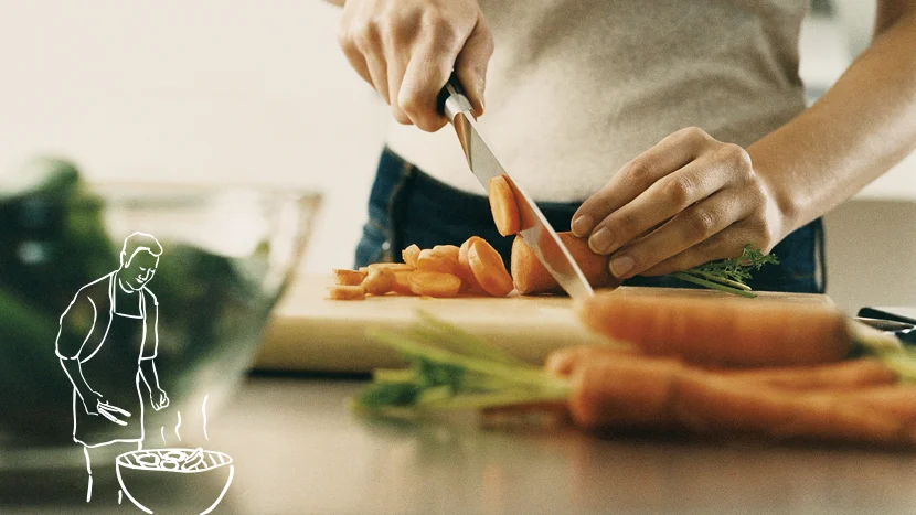 Personne qui prépare un repas